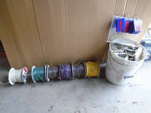 Qty of 6 spools of wire. Full spool is 500 14 gauge type mtw & bucket of electrical components. As shown.