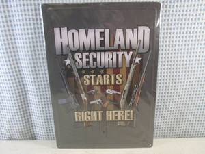 lot 158 image: (EC1) Homeland Security Starts Right Here Embossed Tin Sign with Rolled Back Edges 16 34 x 12 - New in Wrap