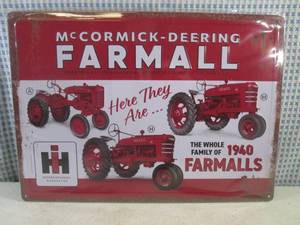 lot 160 image: (EC1) McCormick-Deering Farmall Tractors Embossed Tin Sign with Rolled Back Edges 16 34 x 12 - New in Wrap
