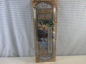 lot 163 image: (H-2) Metal Thermometer A Fisherman Lives Here... Graphics 5 18 x 17 38 - New In Packaging