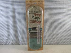 lot 166 image: (H-2) Metal Thermometer What Happens In The Garage...Stays In The Garage Graphics 5 18 x 17 38 - New In Packaging