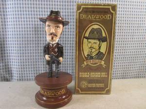 lot 313 image: (FS) Rare Deadwood Seth Bullock (Timothy Olyphant) Bobble-Headed Doll with Box 9 14 Tall
