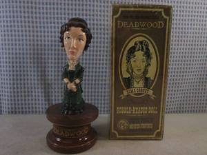 lot 317 image: (FS) Rare Deadwood Alma Garret (Molly Parker) Bobble-Headed Doll with Box 9 14 Tall
