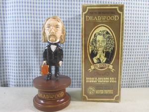 lot 321 image: (FS) Rare Deadwood Doc Cochran (Brad Dourif) Bobble-Headed Doll with Box 8 78 Tall