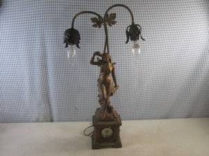 lot 339 image: (G-1) Vintage Lady Figure Electric Lamp with Wind-Up Lux Clock Company Clock In Base 24 Tall - Lamp and Clock Work