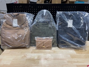 lot 32 image: Backpacks and Handbag