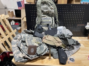 lot 50 image: Military Clothing and Back Pack