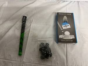 lot 58 image: Golf Club Grip, Pressure Putt Trainer, and Golf Shoe Spike Replacements