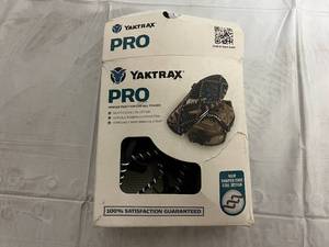 lot 70 image: Yaktrax Pro Traction Device - Size Medium (Size Conversion in Pictures)