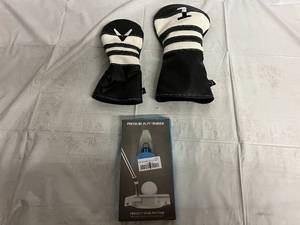 lot 90 image: Two Callaway Golf Club Heads and Pressure Putt Trainer