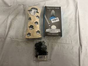 lot 98 image: Golf Club Cover, Pressure Putt Trainer, and Golf Spike Replacements