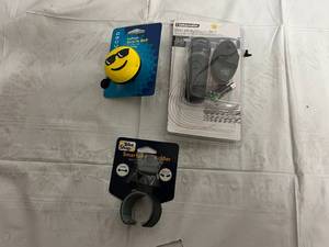 lot 111 image: Bike Accessories - Bell, Phone Holder, LED Light Set