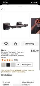 lot 86 image: Delta Portwood Wall Mount Pivot Arm Toilet Paper Holder Bath Hardware Accessory in Venetian Bronze ($29.48 Retail Value)