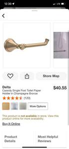 lot 92 image: Delta Cassidy Single Post Toilet Paper Holder in Champagne Bronze ($40.52 Retail Value)