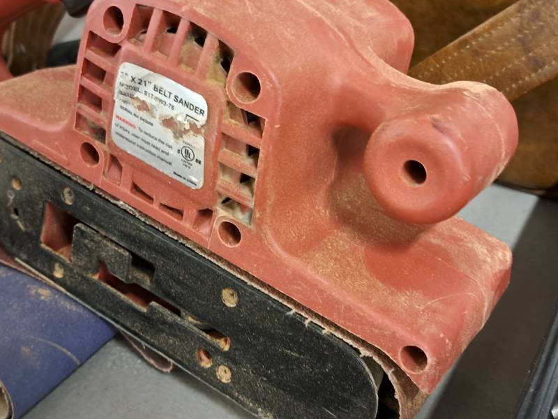 lot 102 image: Belt Sander 3x21 with Extra Sanding Belts and Tool Bag