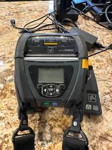 Zebra Portable Thermal Label Printer Model#QLN420 with charging dock & battery