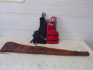 lot 106 image: Gun Case and Life Jacket
