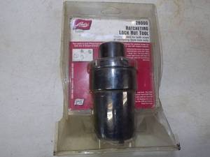 lot 121 image: Lock out tool