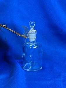 lot 12 image: Box of 12 - 125ml TK Dropping Bottles VINTAGE (Mickey Mouse Shaped Caps)