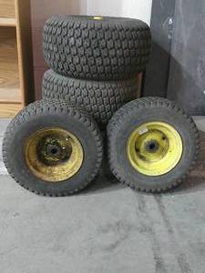 lot 5 image: Lot of 4 Universal Heavy Duty Tires- 9 9-14 Rims-Good Tread