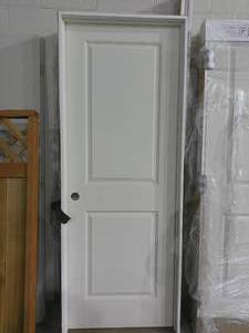 lot 25 image: 2 x 6 Bayer Built Primed Hallow Panel Door-Missing Trim-Right Hand