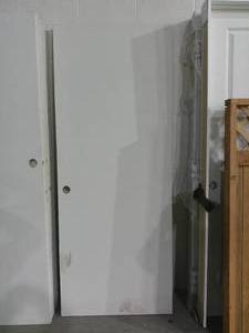 lot 26 image: Lot of 2 Primed Hallow Panel Doors 80 x 31-34 Pre Tapped Handle & Hinges