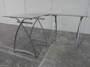 lot 34 image: L Shaped Metal Frame Glass Top Work Station 31 x 19-34 x 29-May Need Adjustment  Reassembly