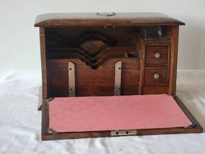 lot 18 image: Rich Antique Traveling Campaign Desk  with Original Quill & Bone Burnisher