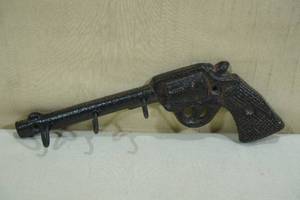 lot 65 image: Cast Iron Revolver CoatKey Hook