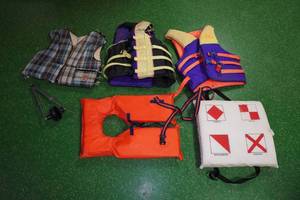 lot 98 image: Assorted Life Jackets and Outboard Ear Muffs