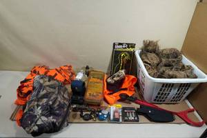 lot 99 image: Assorted Firearm and Hunting Gear - Camo, Pigeon Thrower, Holster, Targets