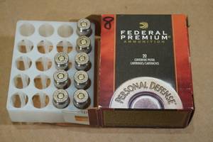 lot 134 image: 8 Federal Personal Defense .40 S&W 165 Gr Hydra Shok JHP Ammo