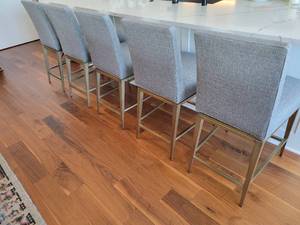 A set of 5 KitchenBar Counter Stools. With swivel memory seats. Retailed for $1,799 each.