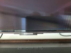 Samsung 65 TV with Remote, Samsung Soundbar, Woofer and Mounting Bracket.