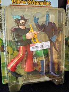 lot 42 image: McFarlane Toys Beatles Yellow Submarine Ringo and John Figurines