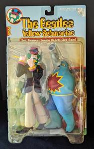 lot 43 image: McFarlane Toys Beatles Yellow Submarine Paul and George Figurines