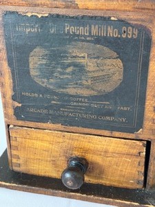 lot 12 image: Antique Arcade Coffee Grinder