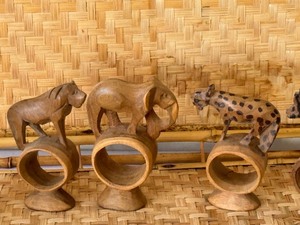 lot 48A image: Vintage Woven Trays and Wooden African Animal Figurine Napkin Rings
