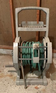 lot 168 image: Suncast Hose Reel with Hose