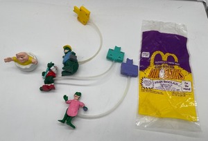 Dinosaurs 90s TV show Disney Happy Meal Toys.