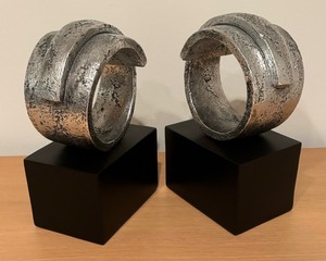 lot 27 image: Pair of Abstract Bookends by Uttermost