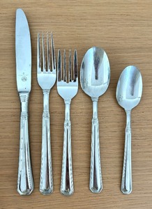lot 93 image: Pfaltzgraff Flatware Grouping