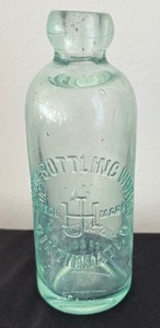 lot 105 image: Decorative Green Glass Bottles and Candle Holders