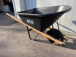 lot 253 image: Ace Hardware Six Cubic Foot Wheel Barrow with Wooden Handles