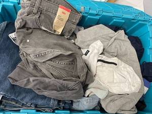lot 128 image: Box of Jeans and hoodies