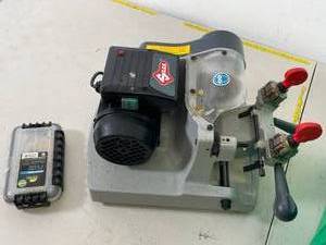 lot 136 image: Key Cutting Machine and box of Keys