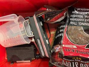 lot 171 image: Tobacco bags and rolling machines
