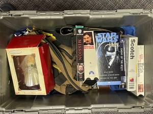 lot 249 image: American Flag VHS and Barbie