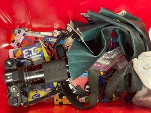 lot 278 image: Camera and matchbox cars and gloves