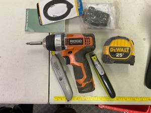 lot 283 image: Ridgid Drill in dewalt bag
